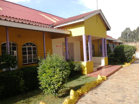 A one-storey yellow-painted building